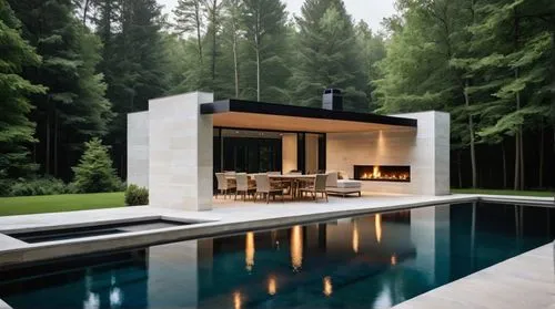 An ethereal photograph, A detailed, serene oil painting. Pool house exterior.  Dark black wood and white travertine stone. Long Fireplace on the far big wall. Forest behind.,an outdoor dining area and
