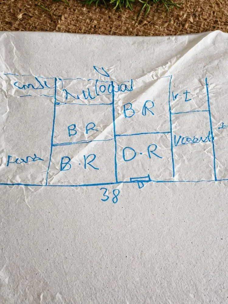 a piece of paper with blue writing on it