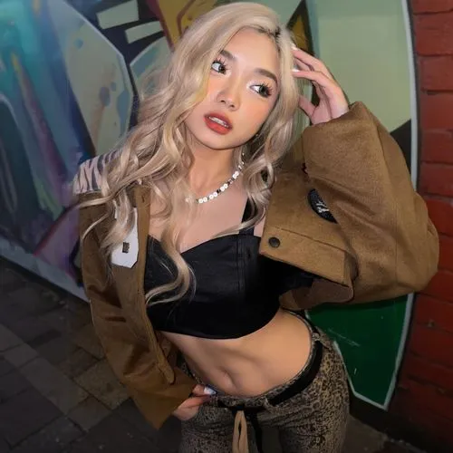 a woman in a black top is standing near a wall,jordyn,teya,nari,gyaru,tana,natashquan,cacia,azn,gabsi,sian,abs,joo,zhaowen,ariela,chonnam,poki,jungwirth,chae,hyoon,ann