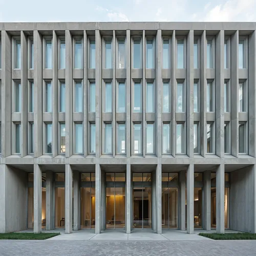 A meticulously arranged facade that uses repetitive, modular panels to create a sense of rhythm and precision,a building made of two stories with many windows,bocconi,associati,moneo,architekten,bruta