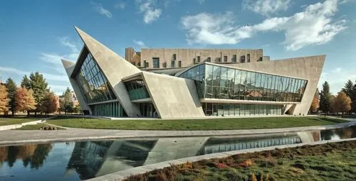 MUSEUM COLOR MODERN FUTURIST,a large building with a large pointed roof sitting next to a body of water,biotechnology research institute,university library,new building,music conservatory,contemporary