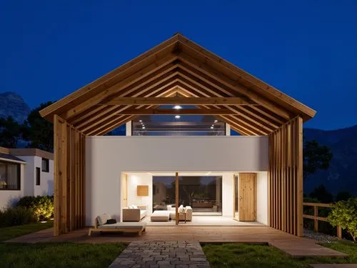 A photo-realistic rendering of a modern wooden house with a minimalist design, set against a dark blue night sky with mountains in the background. the house has a wooden frame and a sloping roof, with