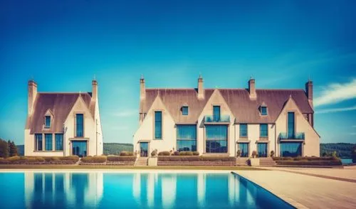 glass bricks tiles garden sunlight blue sky landscape people lake trees park hotel forest mountains summer,a large mansion next to a swimming pool,leaseholds,house insurance,luxury property,pool house