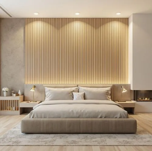 A minimalist bedroom with a linear wooden panel wall and ambient lighting. The centerpiece is a plush bed with neutral tones, a soft area rug, and a modern fireplace on the side, creating a cozy yet s