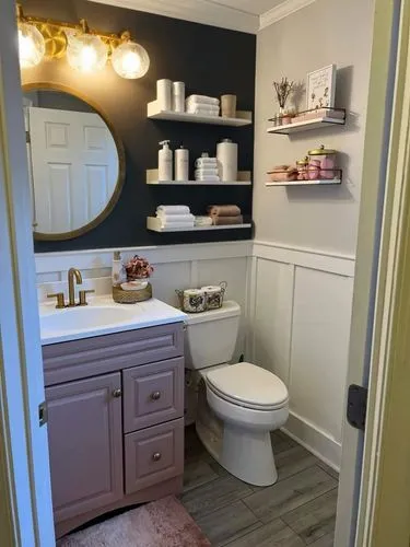 a bathroom open shelf,bathroom with grey cabinets, white toilet and white counter,mudroom,bathroom,bath room,luxury bathroom,modern minimalist bathroom,bathroom sink,beauty room,entryway,kitchen remod