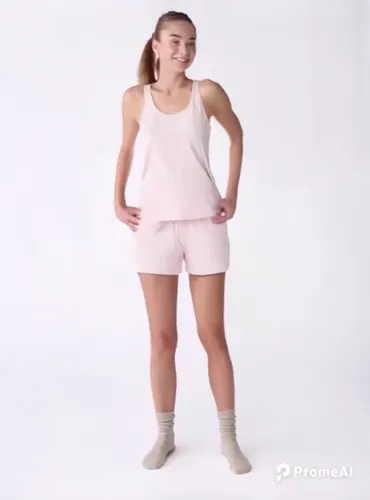 Create a video in which a young girl performs energetic breakdancing moves in a daylight loft studio. The focus is on her athleticism and stylish dance routine, including spins, flips and freezes.,rex