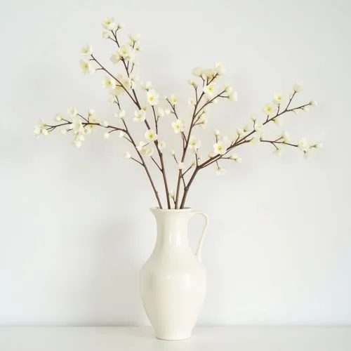 delicate elegant decorative branches ,on white wall,frontview, simple elegant   cream vase
,a white vase with a bunch of white flowers in it,a sprig of white lilac,white magnolia,white lilac,tuberose,