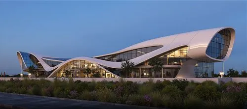 the building is designed like a curveskining curve,futuristic art museum,futuristic architecture,morphosis,etfe,safdie,modern architecture,calatrava,snohetta,kaust,soumaya museum