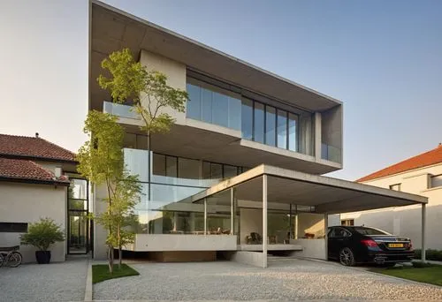 a large building with a lot of windows,modern house,cube house,cubic house,modern architecture,lohaus,residential house,Photography,General,Realistic
