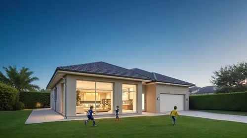 children playing in the grass outside of a house,house shape,residential house,modern house,weatherboard,folding roof,dunes house,family home,inverted cottage,cube house,weatherboards,smart home,house