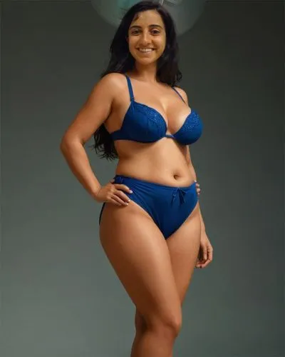 a middle-aged woman. she's very short. she's plump. she has a thick waist. she has thick thighs. she has a pot belly. she's standing sideways. seen from the side. full body shot. high resolution and u