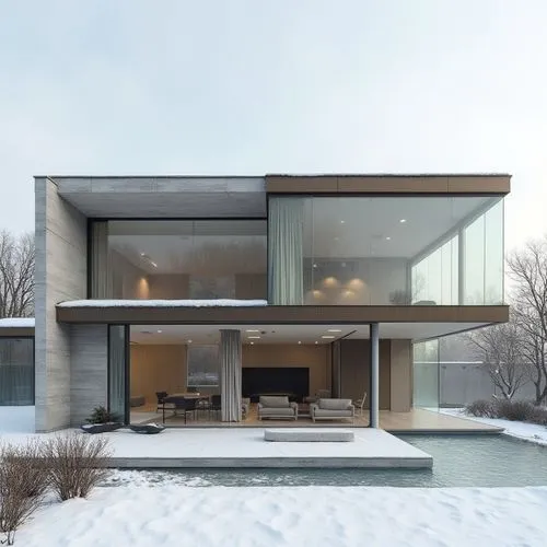 ,an exterior view of a large modern building in the snow,cubic house,modern house,glass facade,cube house,winter house,modern architecture,cantilevered,breuer,snohetta,structural glass,mirror house,d