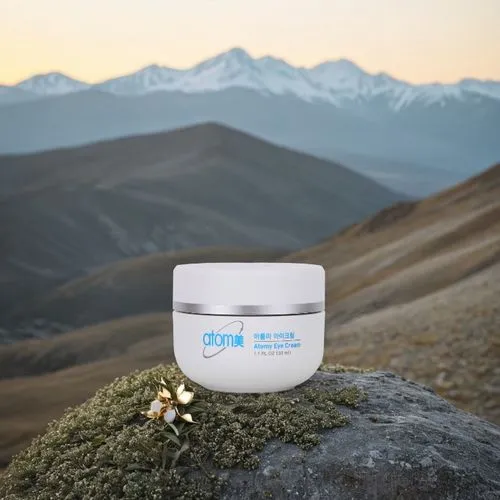 Create an elegant, clean, and luxurious background for a beauty cream packaging shot. The scene should evoke a sense of sophistication and purity, aligning with the Atomy brand's commitment to high-qu