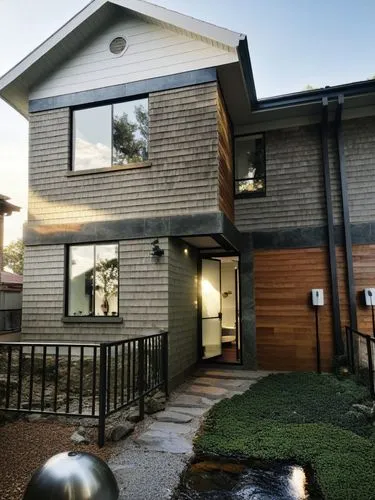 a house with wood siding, iron railing and a yard,mid century house,cube house,modern house,real estate agent,igtv,wahroonga