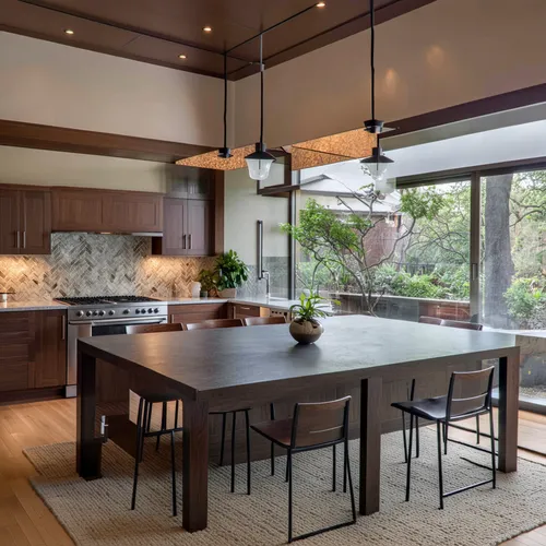 Beautiful modern  contemporary style interior  kitchen ,a kitchen with a large wooden table and chairs Oasis Designs ,modern kitchen interior,modern kitchen,kitchen design,kitchen interior,countertops