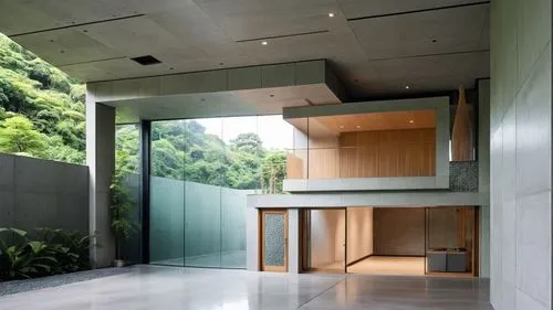 a view of a large room with doors that open in the background,cantilevered,cubic house,exposed concrete,modern house,cube house,cantilevers,clerestory,modern architecture,concrete ceiling,residential 