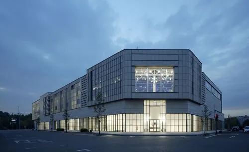 a factory architecture, silver grey glass, aluminium cladding, ultra detail, eye side view, high tech, no error, clear details, ,a very big nice looking building on the street,glass facade,biotechnolo