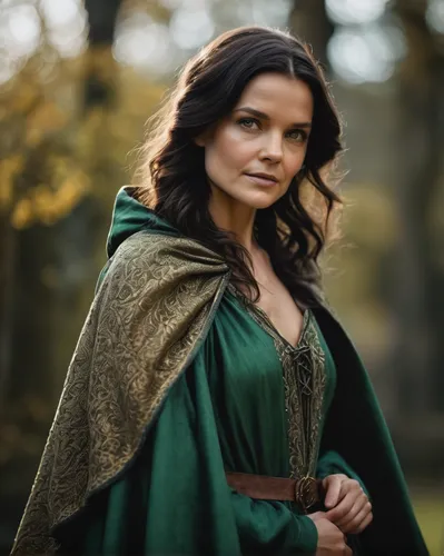 Make a beautiful female with a black long hair and green eyes, make her dressing a medieval dress and a cloak, make her look like Katie Holmes,celtic queen,celtic woman,robin hood,princess sofia,irish