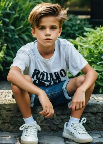 Romeo Beckham, young boy, cute facial expression, messy brown hair, short sides, spiky top, stylish haircut, bright brown eyes, natural makeup, casual wear, white T-shirt, blue denim shorts, sneakers,