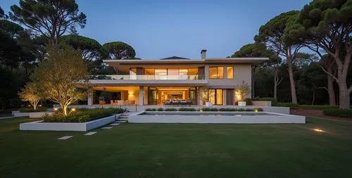 large white building with green lawn and trees,luxury home,modern house,beautiful home,landscaped,modern architecture,luxury property,landscape design sydney,dreamhouse,mid century house,landscape des
