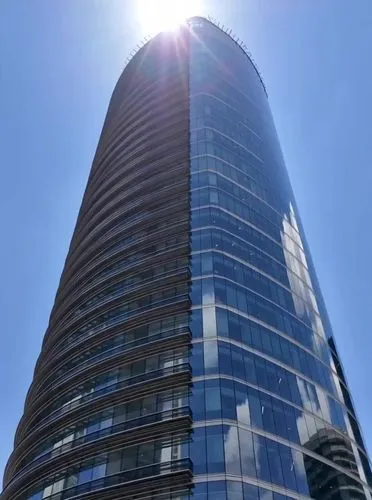 The handsome architect's son explains the redesign of the skyscraper's facade in a parametric style, and the art is completed by the boy's explanation of the facade with repeating parametric patterns.