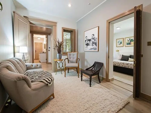 a living room with hardwood flooring and a large white rug,hallway space,mudroom,home interior,showhouse,entryway,contemporary decor,smartsuite,guestroom,belgravia,appartement,ebury,modern room,guest 