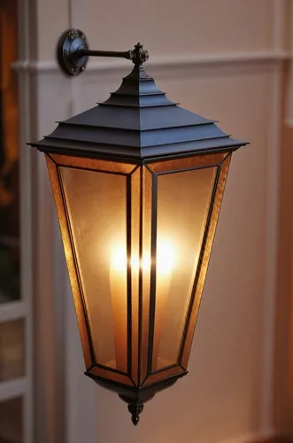 a lamp fixture with a lit bulb in the middle,vintage lantern,illuminated lantern,street lantern,facade lantern,gas lamp,lamplight,oriental lantern,hanging lantern,japanese lantern,christmas lantern,re