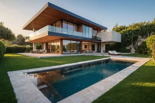 large house with pool in front of it and lots of windows,modern house,modern architecture,beautiful home,dunes house,luxury home