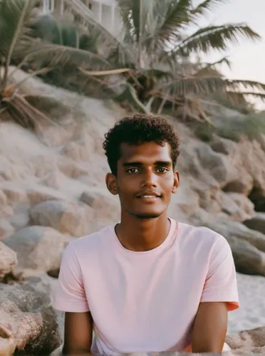 A luxury business beautiful boy sit in beach in amerika ,oman,dubai desert,jumeirah beach,omani,dubai,yemeni,abu-dhabi,qatar,saba banana,abu dhabi,dahab island,dhabi,beach background,doha,jbr,wadi,des