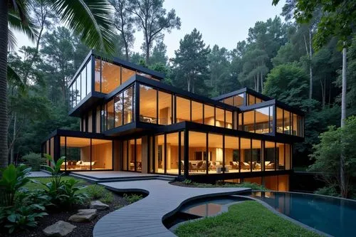 Design stunning glass-walled retreats harmonizing nature with modern elegance.,large glass building with glass walls next to a park,forest house,house in the forest,modern house,modern architecture,ti