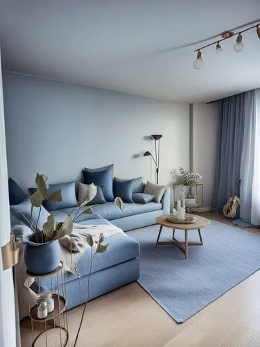 a living room with blue couches and a rug,home interior,furnishing,modern room,furnished,frame house