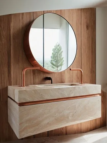 Contemporary bathroom smart design interior, travertine sink, copper faucets, raw woods,a sink sitting under a circular mirror in a bathroom,wood mirror,modern minimalist bathroom,washbasin,bathroom s
