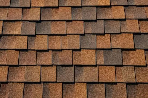 Roof, 30-year architectural shingles, detailed texture, brown color, layered structure, residential building, suburban area, sunny day, clear blue sky, few white clouds, panoramic view, 3/4 compositio