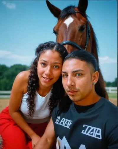 there is a man and woman posing next to a horse,salvadorans,aterciopelados,andalusians,arabians,salvadorians,latinos