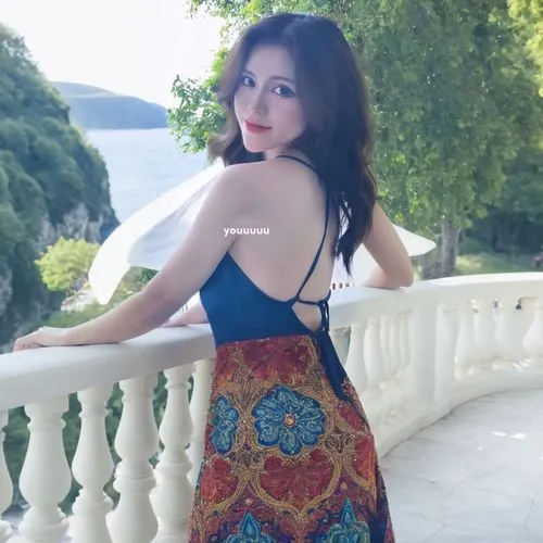 a woman in a dress on a railing,seohyun,yura,cheongsam,qipao,miss vietnam,hyuna,suzy,kaew,azerbaijan azn,lebua,egwene,floral dress,hyoseong,phuquy,haifa,blue floral,vintage dress,huahong,girl in a lon