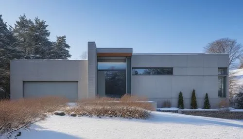 modern architecture at the foot of snowy mountains,snow house,winter house,modern house,dunes house,mid century house,new england style house