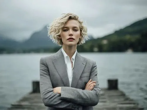 Video content\\n The character in the image floats and flies like a superhero.\\n# Requirements\\n1.Camera Movement：track-up shot.\\n2.Motion Level：Large.,woman in menswear,overcoats,lapels,tuppence,m
