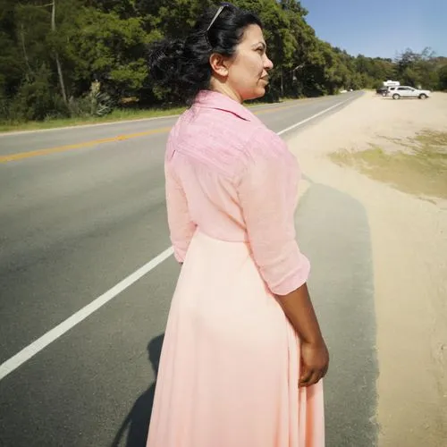 woman walking,marshallese,kanyabayonga,quinceaneras,pregnant woman,tanasugarn,praying woman,girl in a long dress,micronesian,chicanas,a floor-length dress,micronesians,woman in the car,peruvian women,