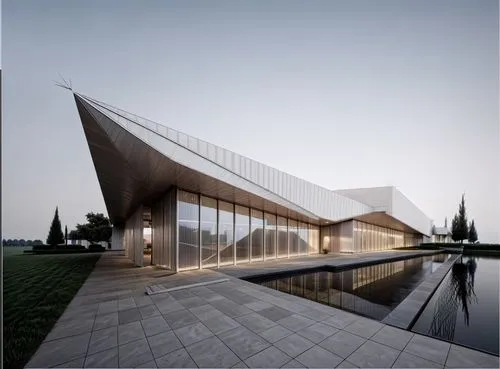 by the lake, at dusk,glass facade,archidaily,modern architecture,kirrarchitecture,cubic house,folding roof,futuristic art museum,architectural,glass facades,cube house,futuristic architecture,structur
