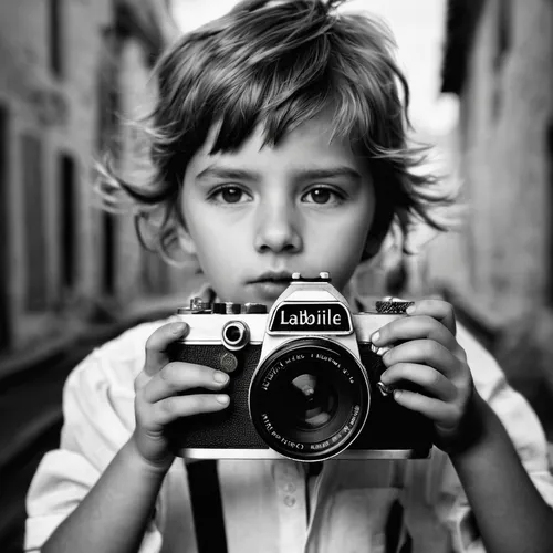 Unleash your creativity with our photo editor - for free,photographing children,photographer,a girl with a camera,camera photographer,slr camera,portrait photographers,photographing,photo-camera,takin