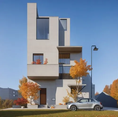 this apartment building has large balconies and windows,cubic house,habitat 67,modern house,modern architecture,cantilevers,apartment building,two story house,residential tower,residential house,apart