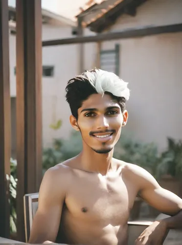 A beautiful boy sit in chair ,pakistani boy,indian sadhu,shirtless,indian,gandhi,indian celebrity,indian girl boy,bapu,sadhu,indian monk,devikund,hindu,tandoori,sikh,guru,bangladeshi taka,alfalfa,sheh