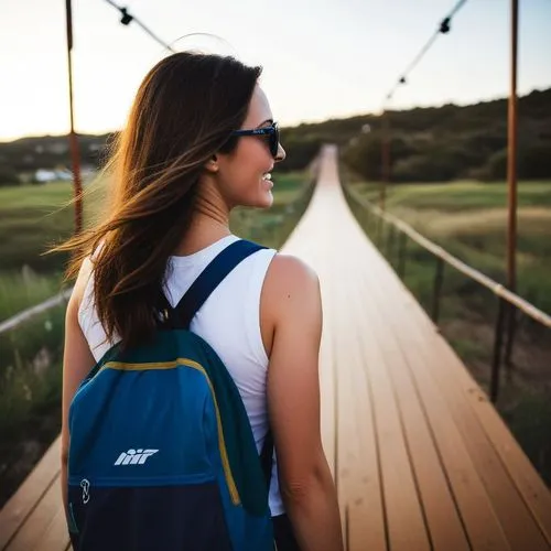 a girl in a blue backpack is walking across the road,travel woman,online path travel,backpacked,backpack,girl walking away,backpacker,woman walking,backpacks,do you travel,backpacking,journeying,adven