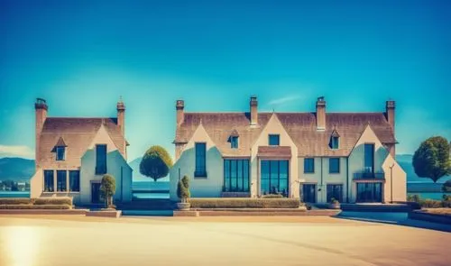 glass bricks tiles garden sunlight blue sky landscape people lake trees park hotel forest mountains,this is the front view of a mansion, with beautiful scenery,bungalows,country house,country estate,h