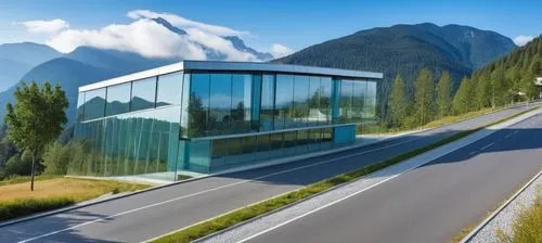 Diseño de un un Edificio Moderno, techos planos y rectos, grades ventanales de vidrios transparentes reflexivos en la fahada, el edificio en de dos pisos en elprmer piso un acceso rectagular amplio, u