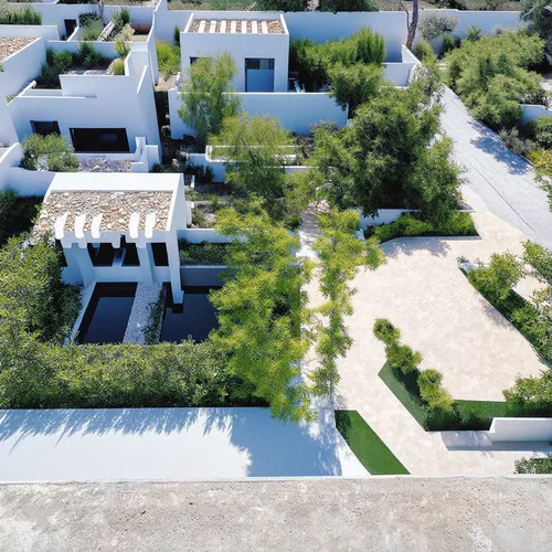 a classic courtyard villas, sustainable modern design in the middle eastern region aerial view,an aerial view of an outdoor dining area and swimming pool,courtyards,roof landscape,roof garden,courtyar