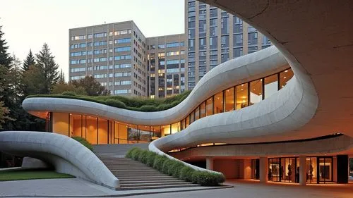 A high-resolution, hyper-realistic architectural photograph capturing a striking, futuristic, multi-level ecotourism complex constructed primarily of smooth, exposed concrete. The design is characteri