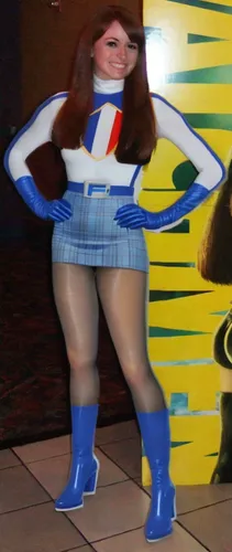 a woman standing next to a painting wearing blue boots,monicagate,sportacus,gioeli,bobinska,elastigirl,thighpaulsandra,kimbundu,bdl,kategaya,robotnik,maracatu,paderina,thickset,pepsu,temime,tinajero,b