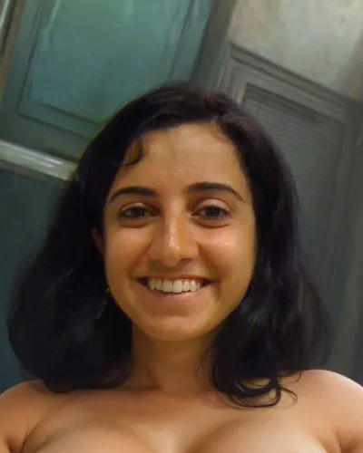 a naked middle-aged woman. she's short. she's a little plump. she has very large breasts. her breasts are sagging. she has big ass. she has thick thighs. she has a bald vagina. she has a pot belly. sh