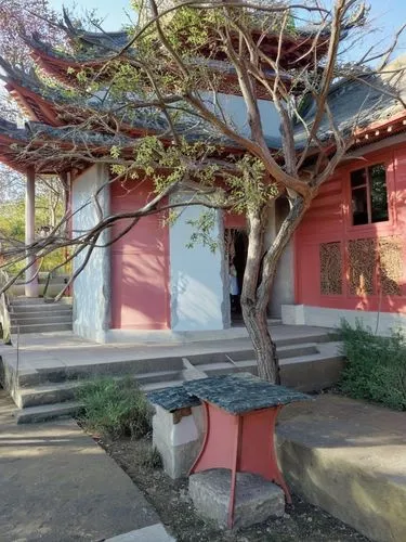 Китайский павильон,a small park bench next to a building,patio,patios,pergolas,ashram,rosewood tree,bungalow